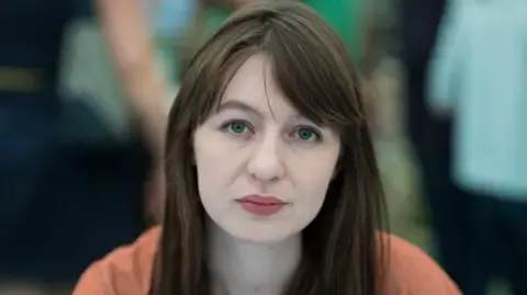 Sally Rooney claims she cannot visit the UK due to potential arrest